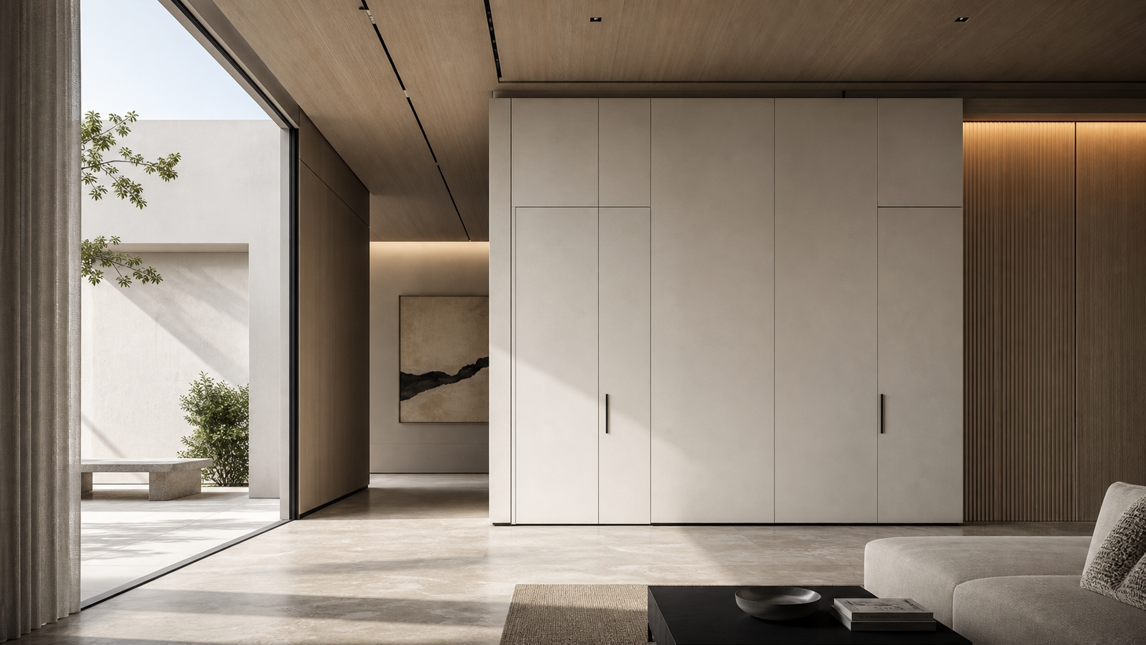 Minimal interior showcasing integrated wall panels and door-wall system